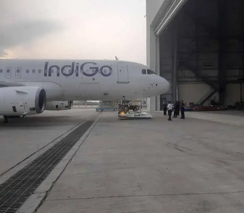 Aircraft parked in hangar