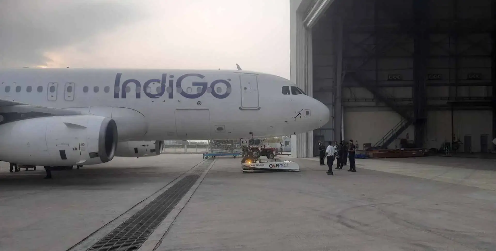 Aircraft parked in hangar