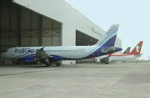 Aircraft parked in a hangar